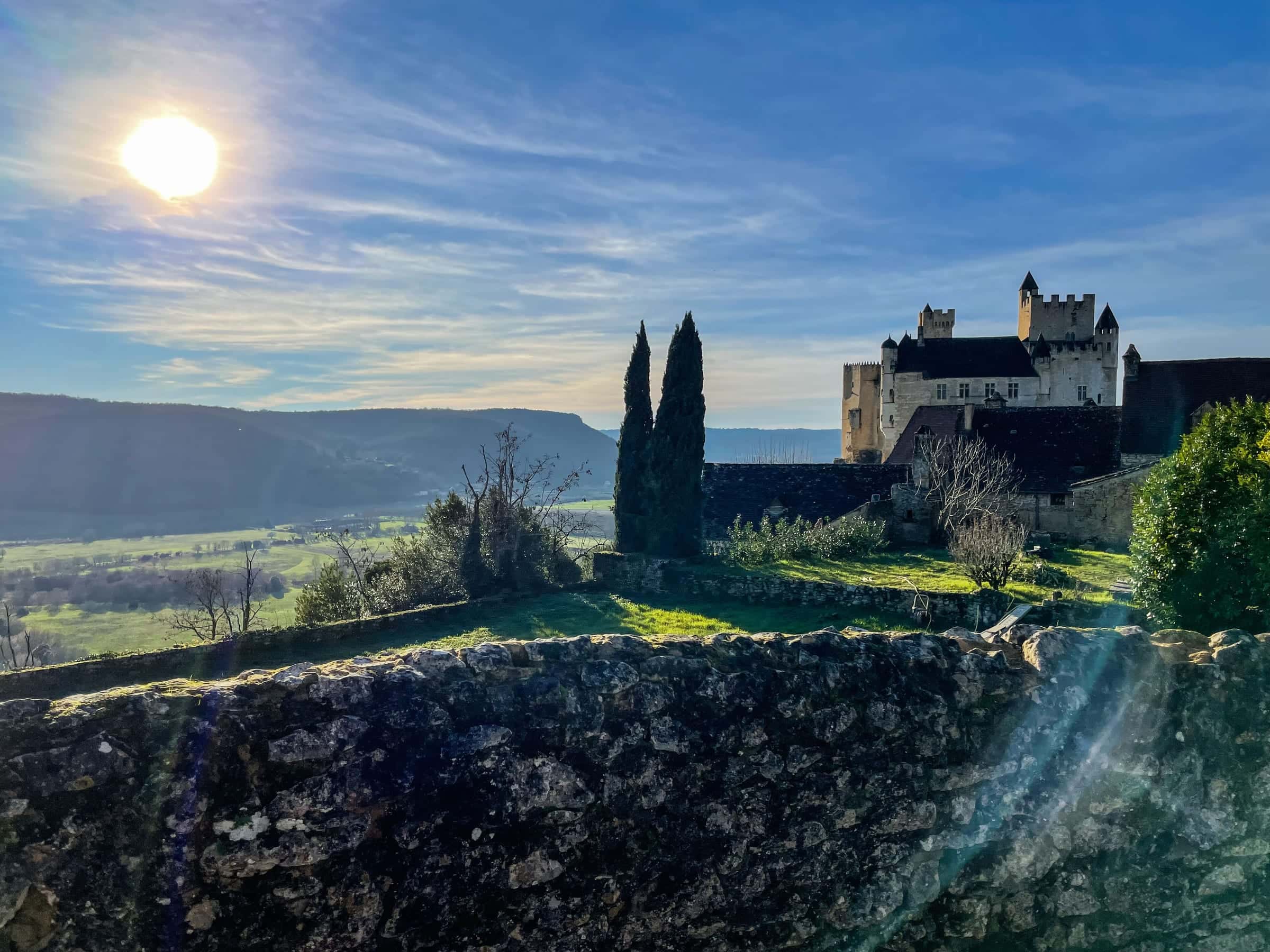Château de Beynac at golden hour, rising above the Dordogne valley, Périgord Noir, France